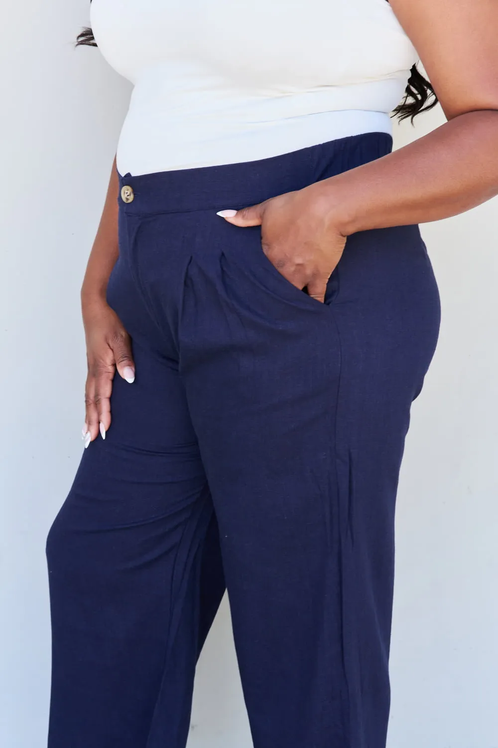 And The Why In The Mix Full Size Pleated Detail Linen Pants in Dark Navy