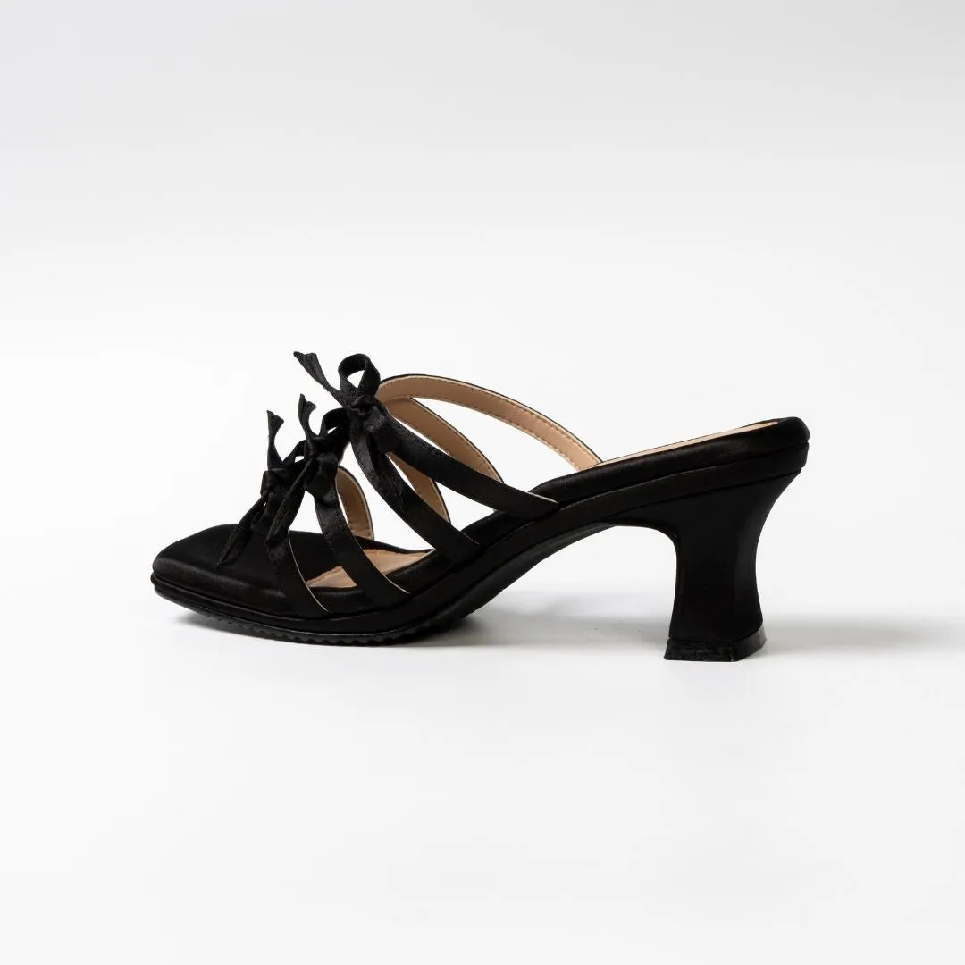 Demure in Black Ribbon Heels