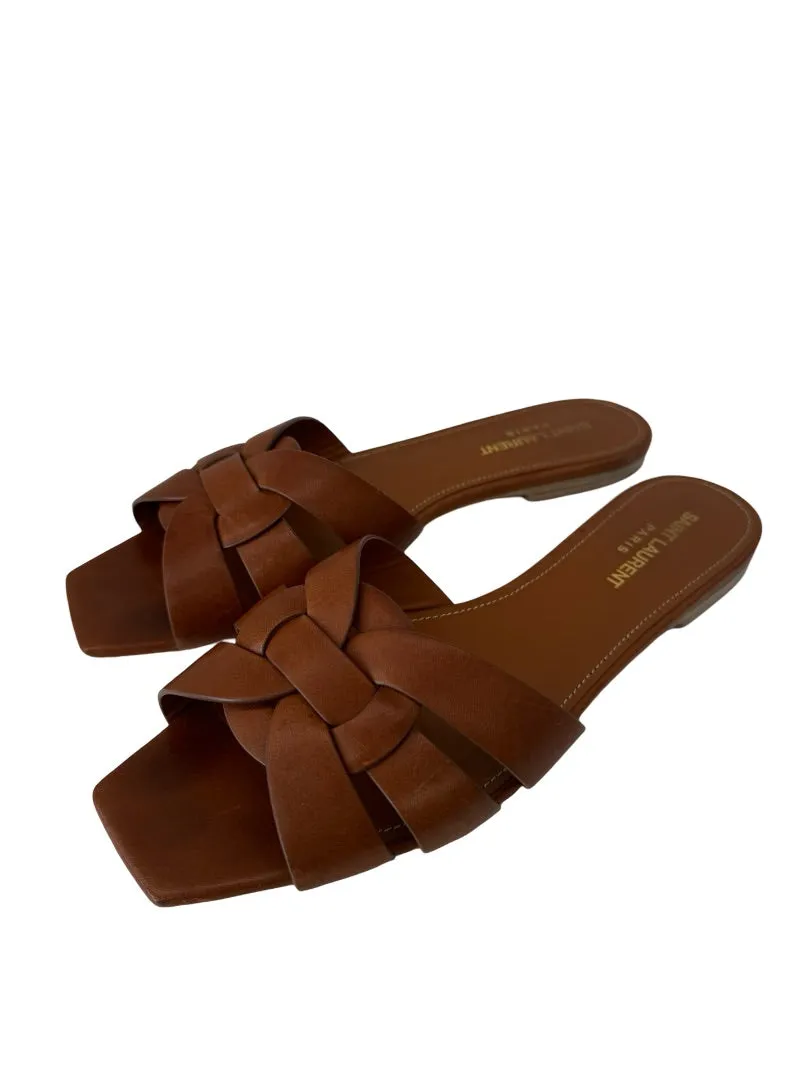 Saint Laurent Tan Tribute Flat Sandals. Size: 39